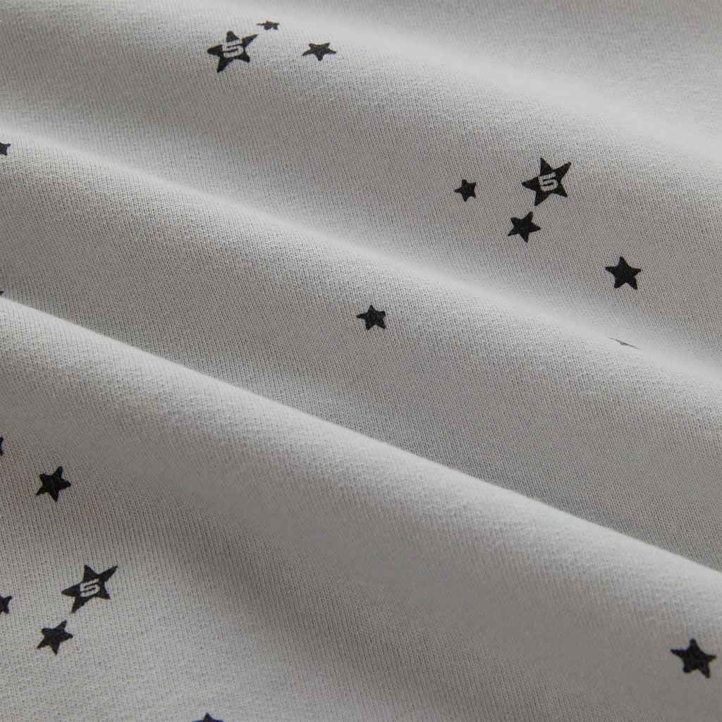 STAR GIRL HOODIE: Light grey 100% cotton fleece with scattered black star print.