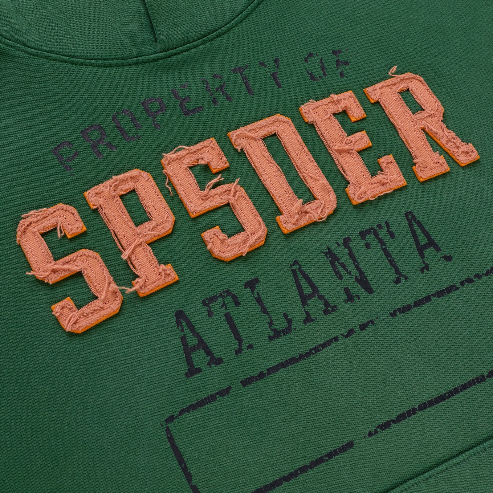 Green cotton fleece hoodie with raised, frayed orange "SPIDER" lettering and faded "PROPERTY OF ATLANTA" print.