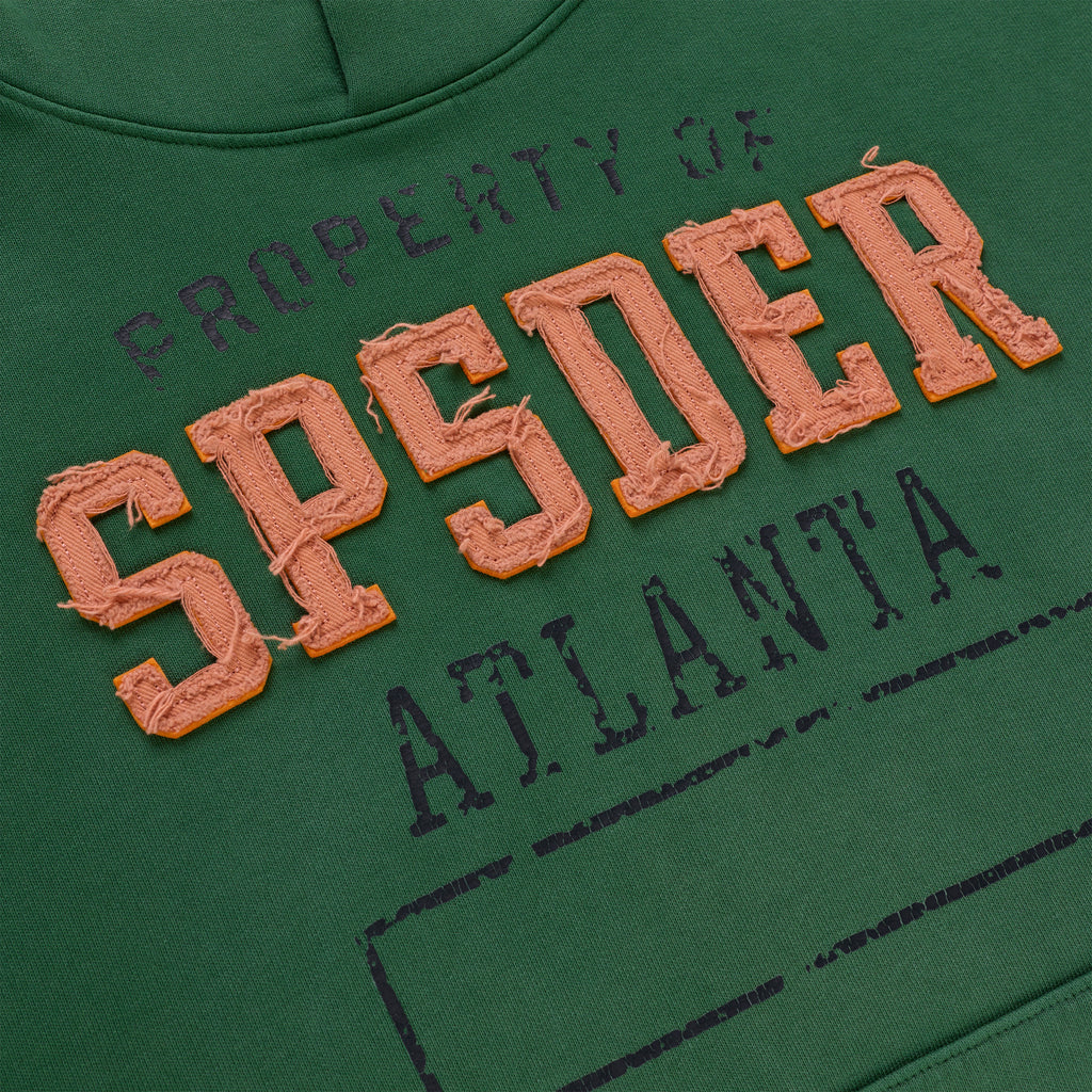 Green cotton fleece hoodie with raised, frayed orange "SPIDER" lettering and faded "PROPERTY OF ATLANTA" print.