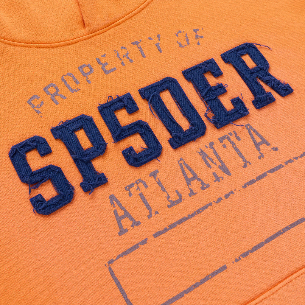 Orange cotton fleece hoodie with raised, frayed navy "SPSDER" lettering and faded "PROPERTY OF ATLANTA" print.