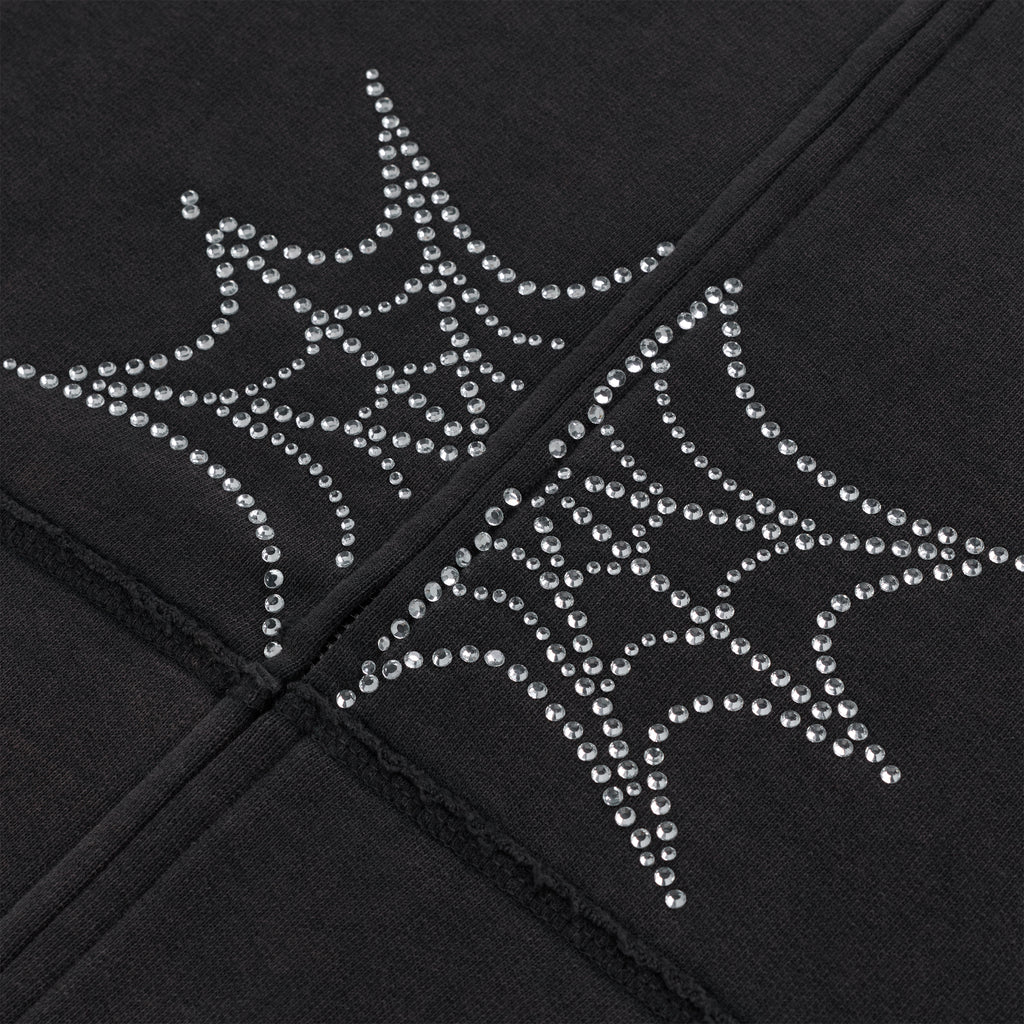 Black cotton fleece hoodie with sparkling rhinestone spider web design.