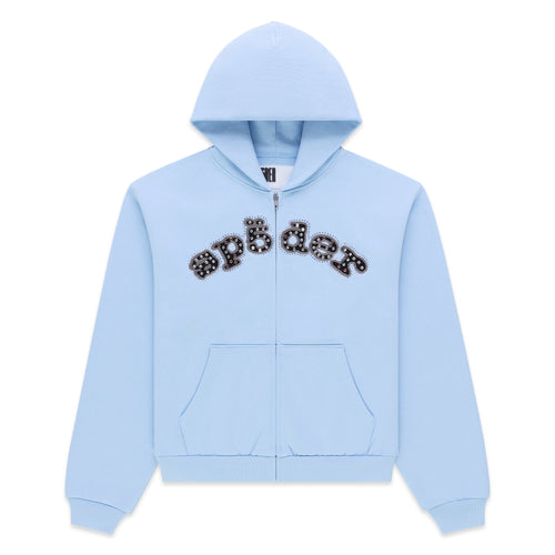 Light blue cotton fleece zip hoodie with "spider" logo embellished with mixed metal studs.