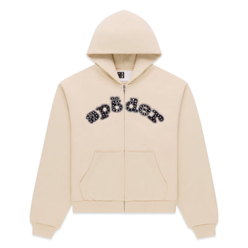 Cream 13oz cotton fleece zip hoodie with "sp5der" logo appliqué embellished with mixed metal studs.
