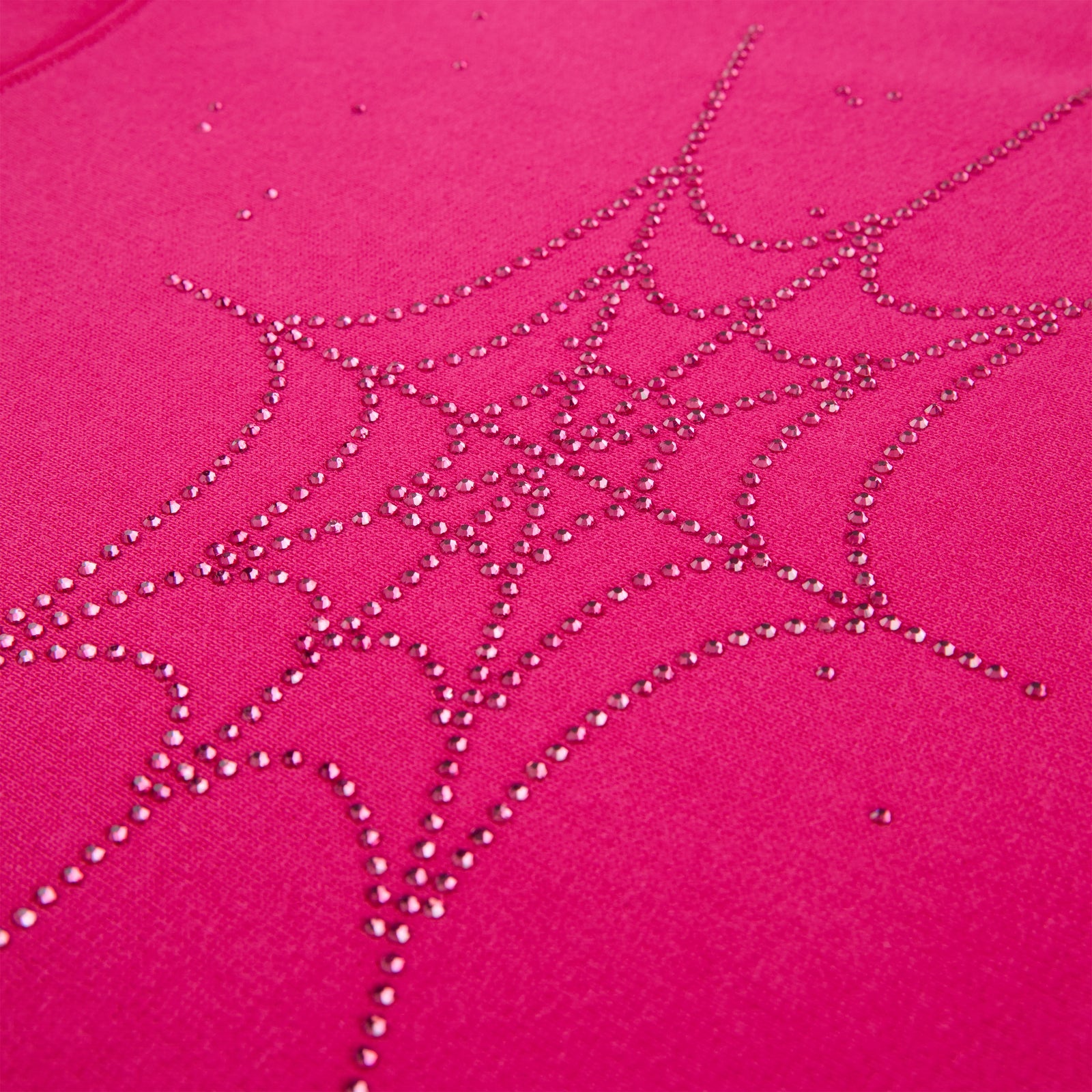 Pink 100% cotton fleece hoodie with a sparkling rhinestone spiderweb design.