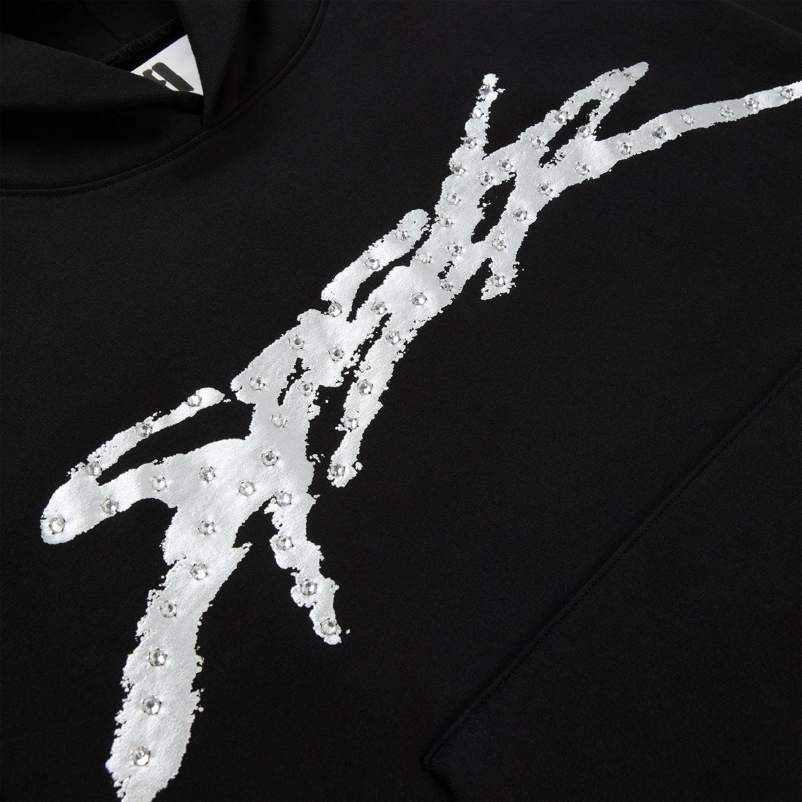 Black cotton fleece hoodie with metallic graphic and rhinestone accents.