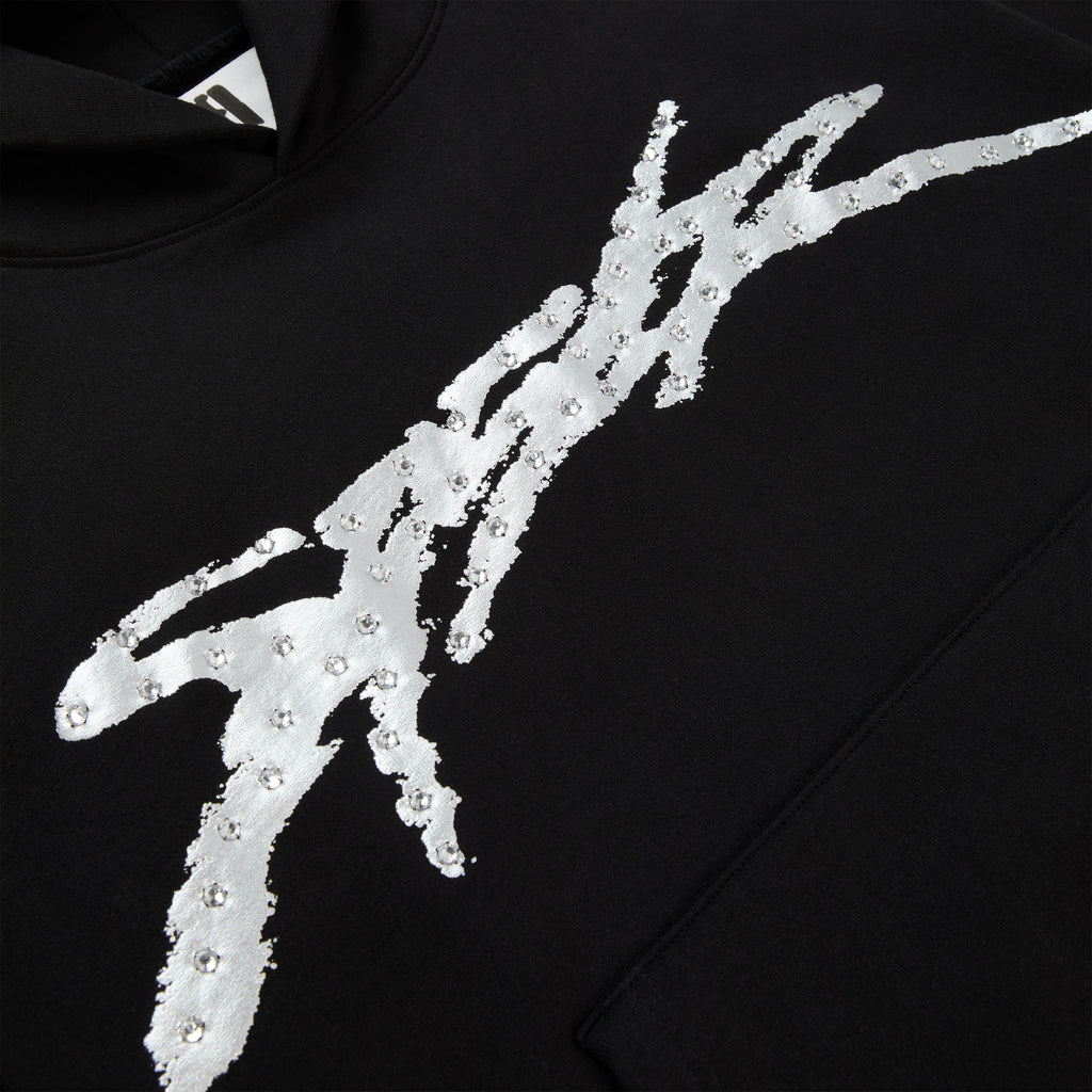 Black cotton fleece hoodie with metallic graphic and rhinestone accents.