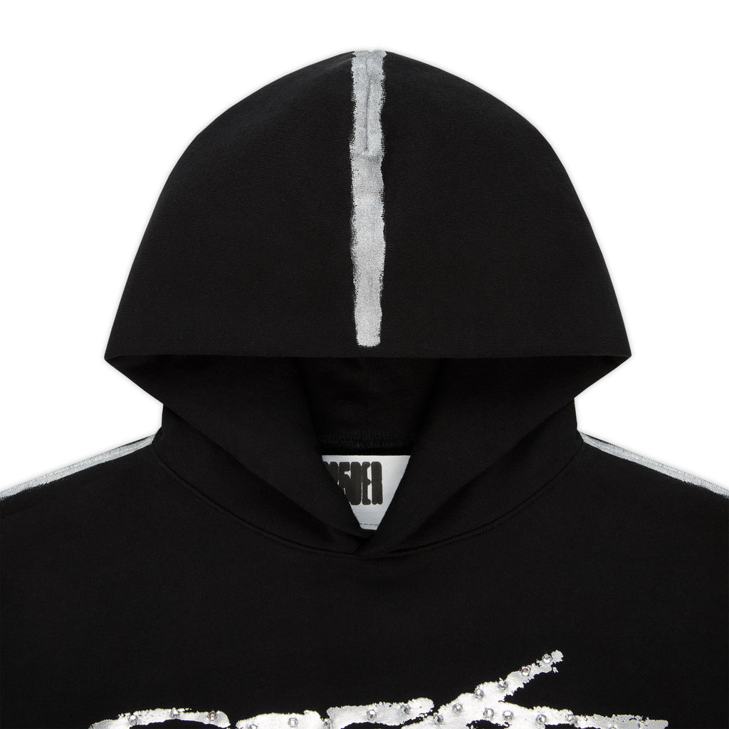 Black cotton fleece hoodie with metallic graphic, rhinestone SP5DER logo, and sprayed-effect stripes.