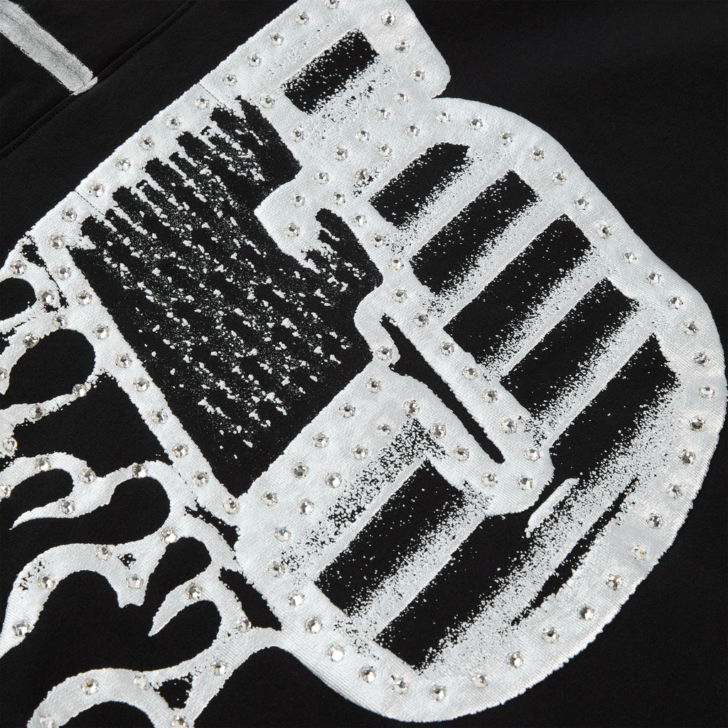 Black cotton fleece hoodie with metallic graphic and rhinestone "SP5DER" logo.