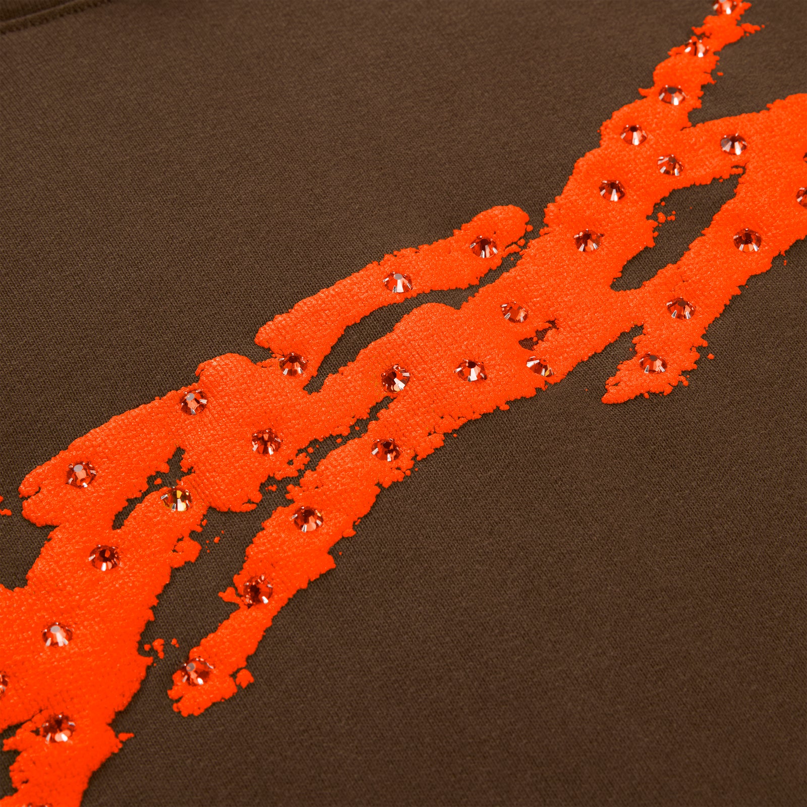 Brown cotton fleece hoodie with orange sprayed-effect stripe and rhinestone accents.