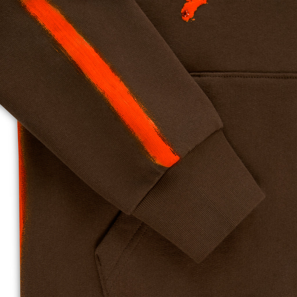 Brown cotton fleece hoodie with a bright orange sprayed-effect stripe on the sleeve and ribbed cuff.
