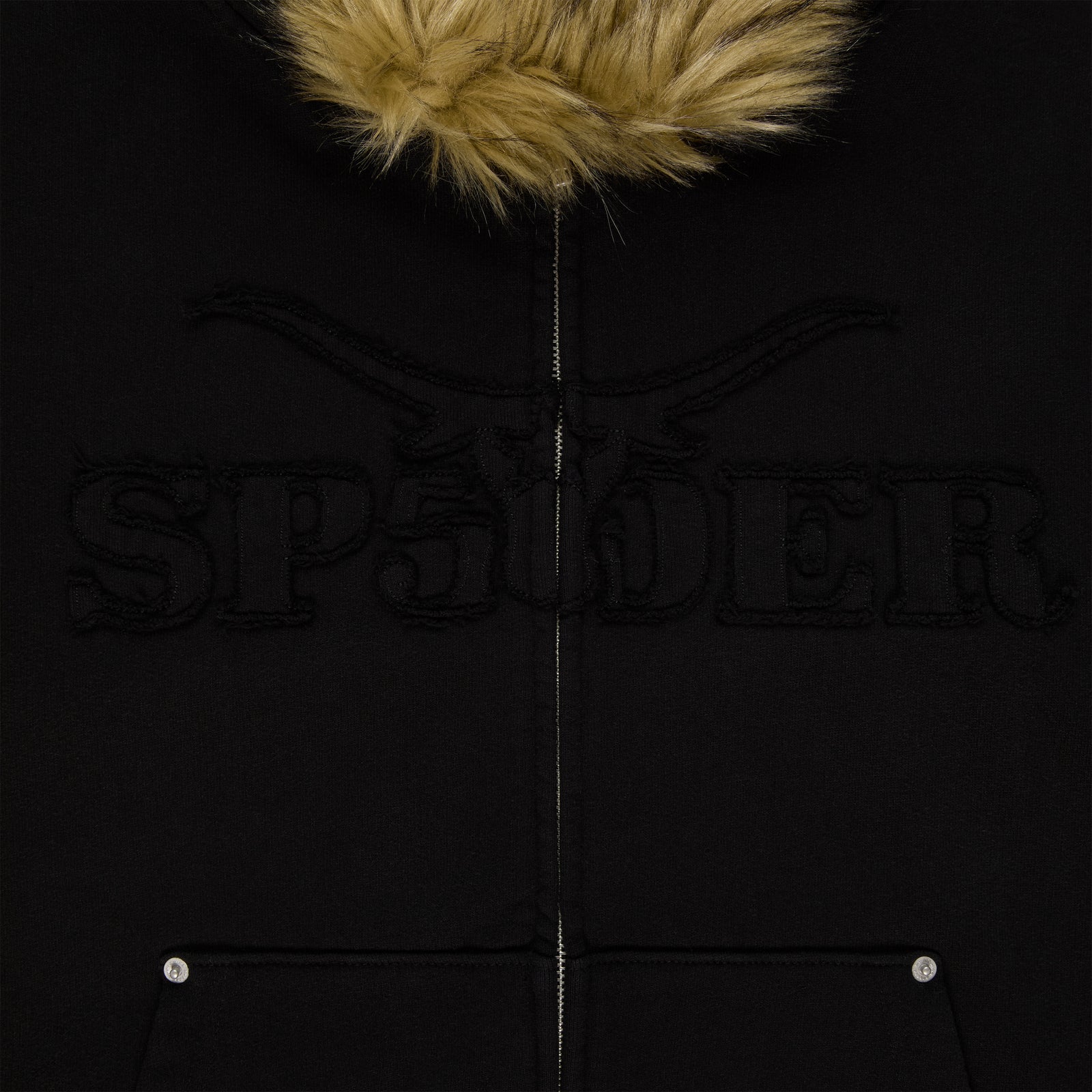 Black 13oz cotton fleece Garibaldi zip-up with faux fur hood trim and SP5DER text patches.