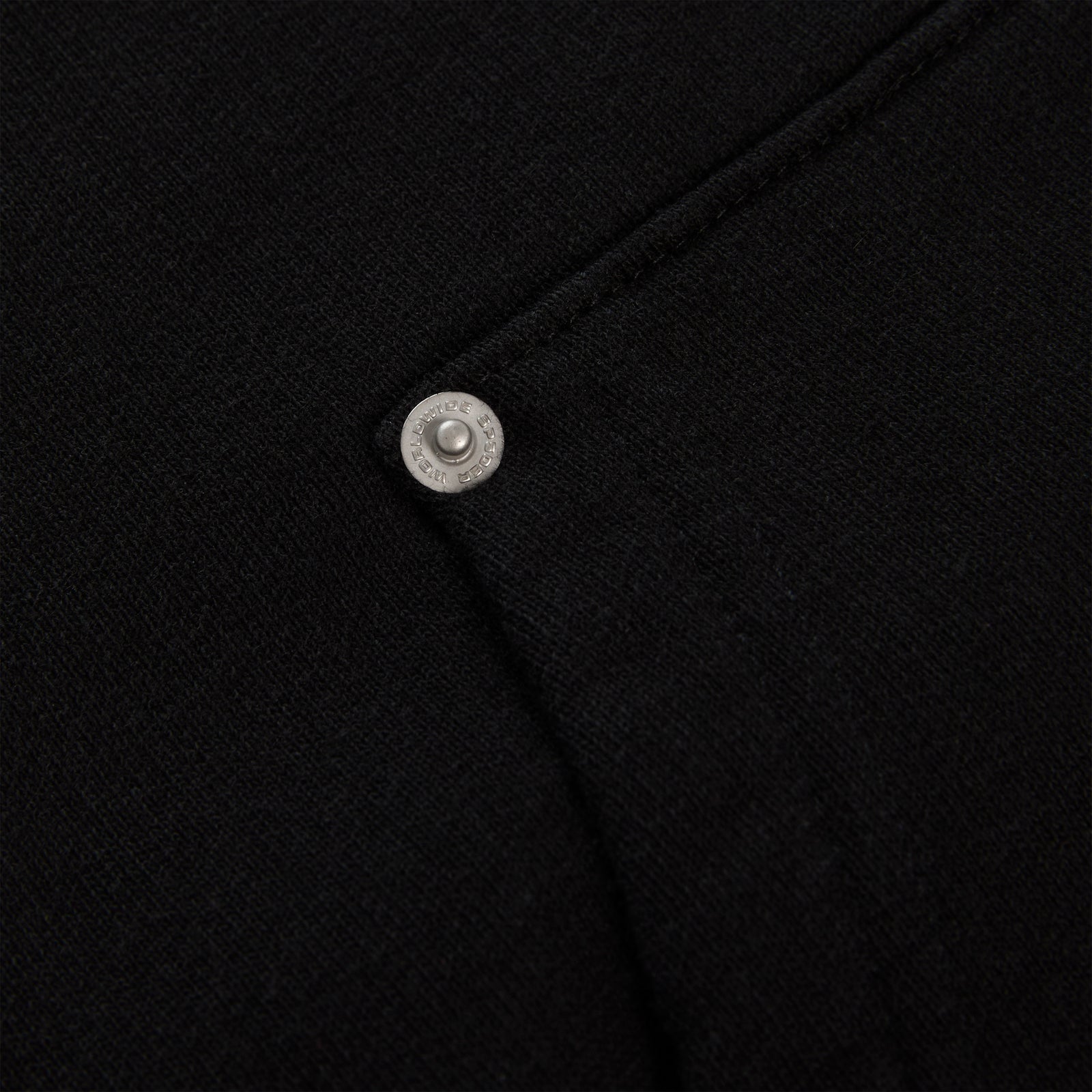 Black 13oz cotton fleece Garibaldi zip-up with silver studded pocket detail.