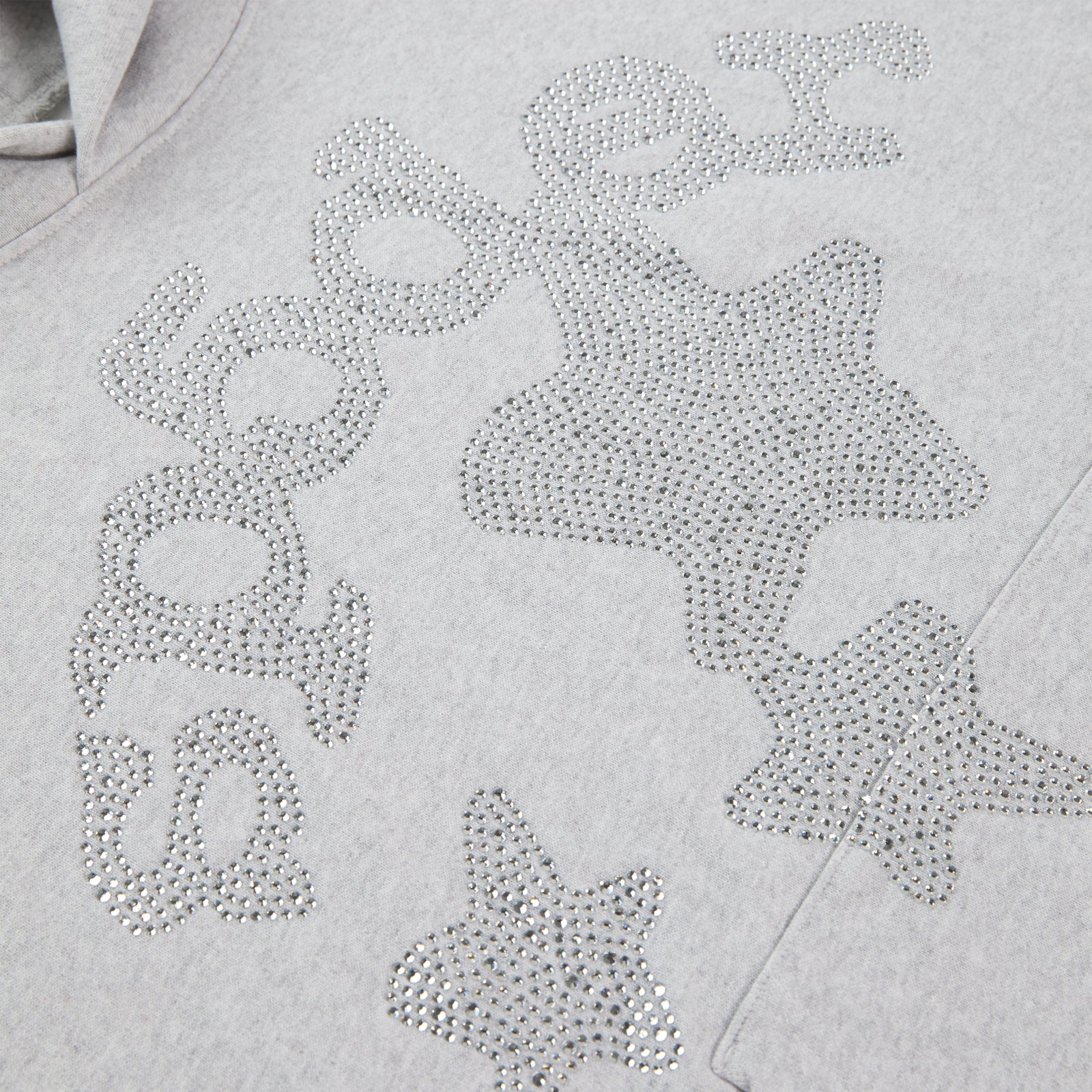 Light grey cotton fleece hoodie with rhinestone "SP5DER" text and star design.