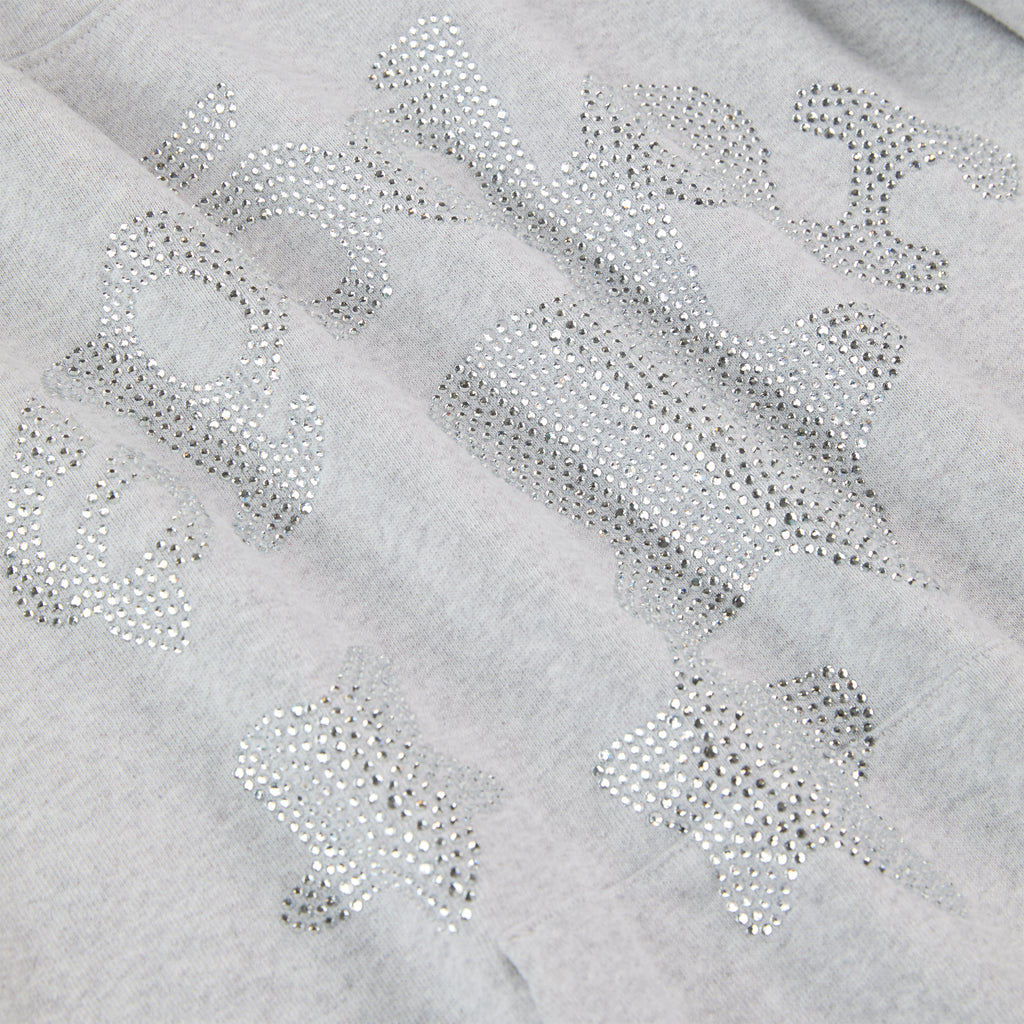 Gray 100% cotton fleece hoodie with rhinestone "SP5DER" text and star embellishments.