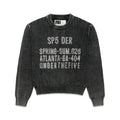 Black knit cotton UNDERTHEFIVE sweater with white text print at chest, ribbed crewneck, hem, and cuffs.
