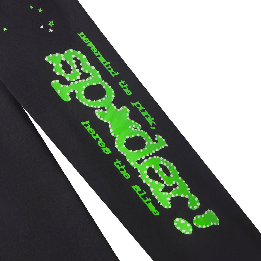 Black cotton fleece sweatpants featuring vibrant green puff print text and scattered star graphic designs.