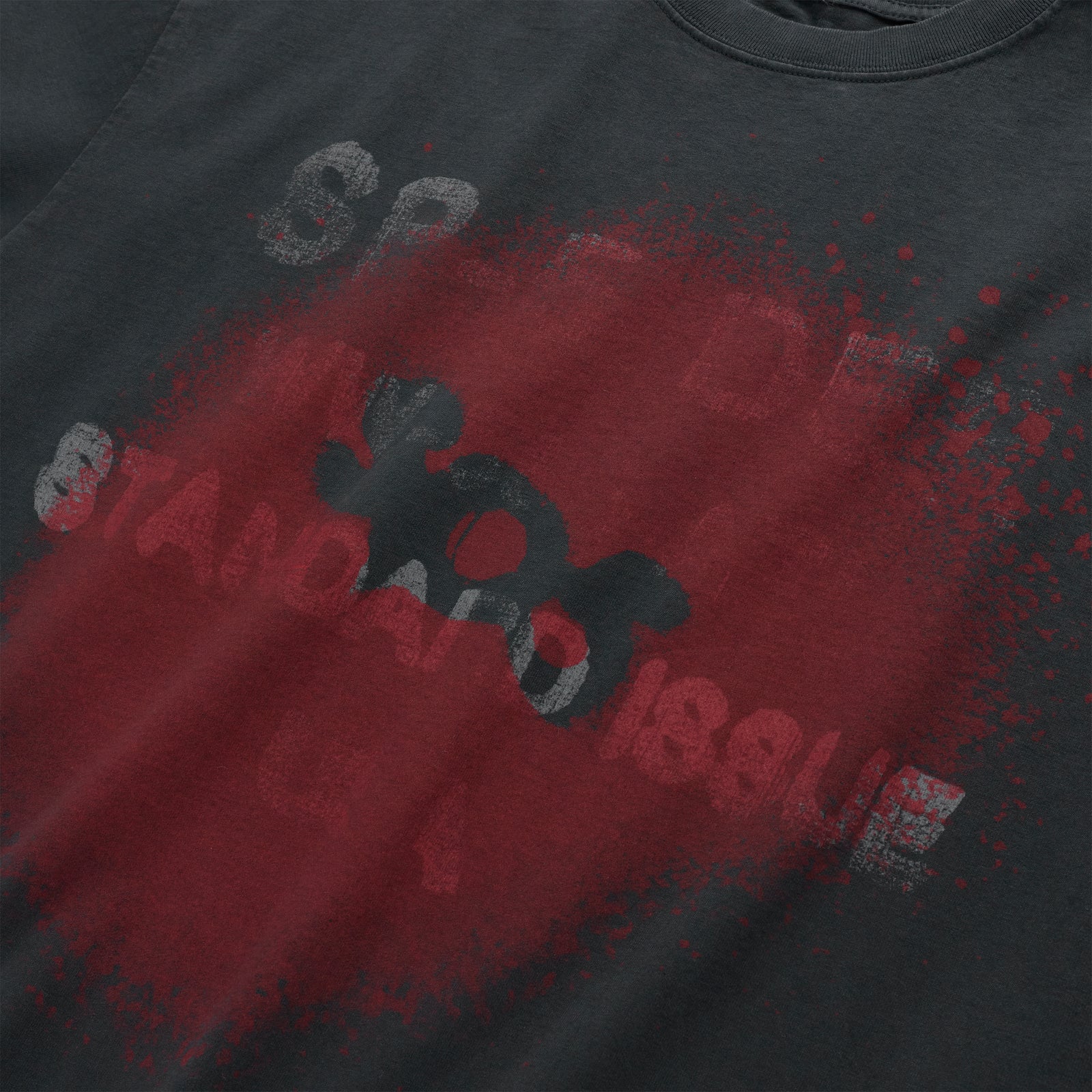 Dark gray 100% cotton tee with a red splatter graphic and "STANDARD ISSUE" text.