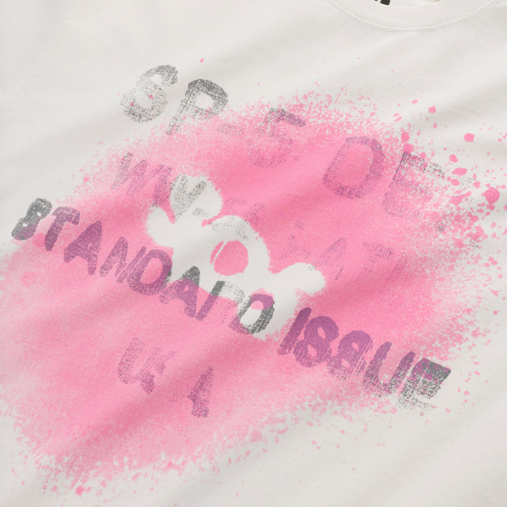 White 100% cotton tee with a pink spray paint graphic and "STANDARD ISSUE" text.