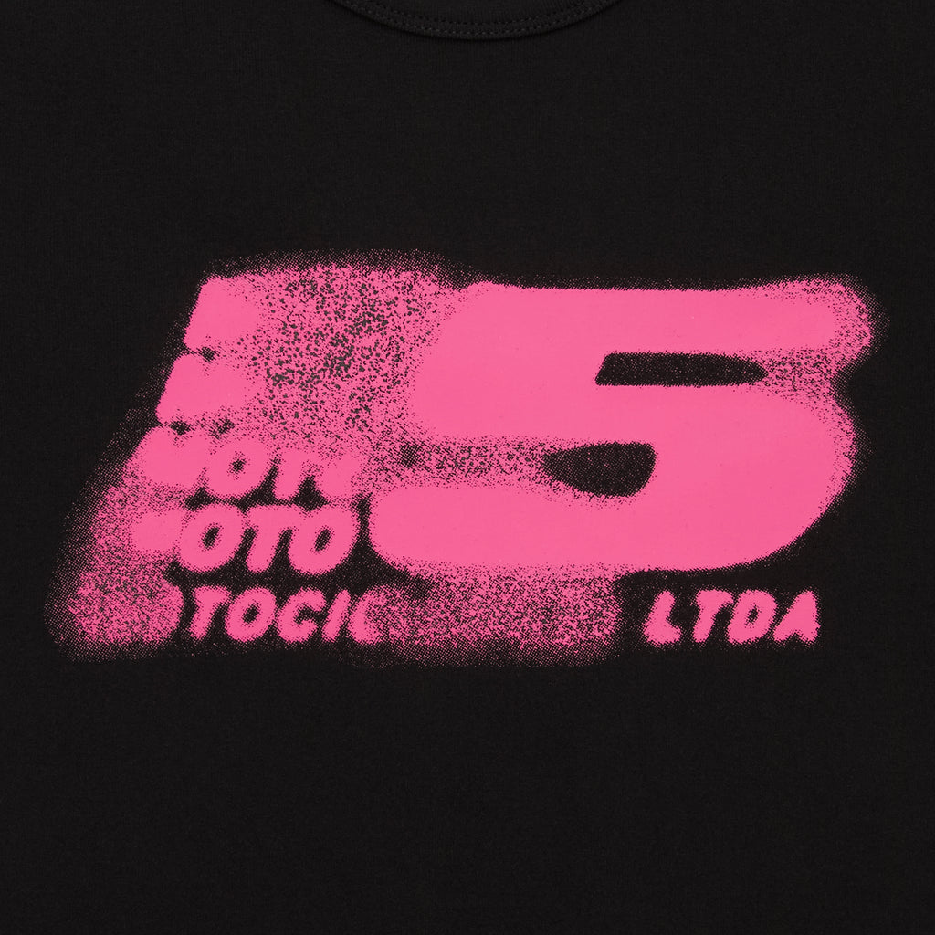 Black cotton/spandex cropped baby tee with a distressed pink "MOTO 5" graphic print.