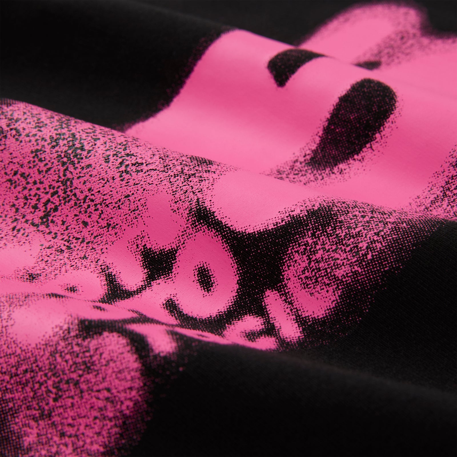 Black cotton/spandex cropped baby tee with a vibrant pink distressed graphic print.