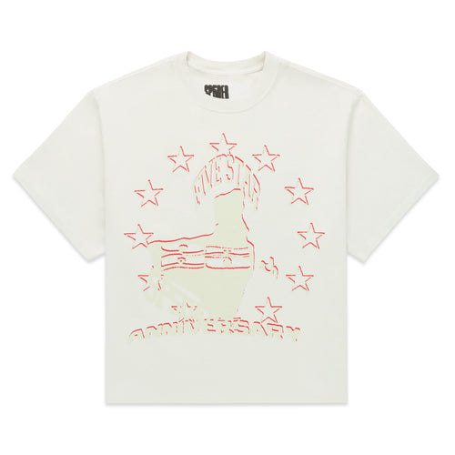 White cotton ANNIVERSARY TEE with red graphic print of a figure surrounded by stars.