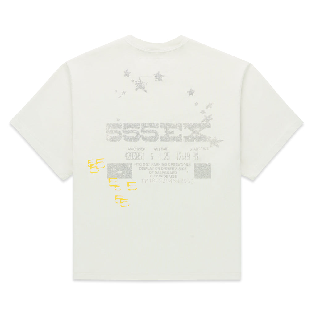 Cream cotton ANNIVERSARY TEE with silver glitter graphic print and yellow text on the back.