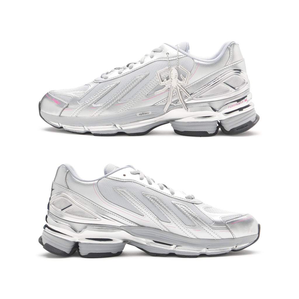 SP5DER x ADIDAS F50 ADIZERO metallic silver sneakers with mesh, chrome overlays, pink accents, and a spider charm.