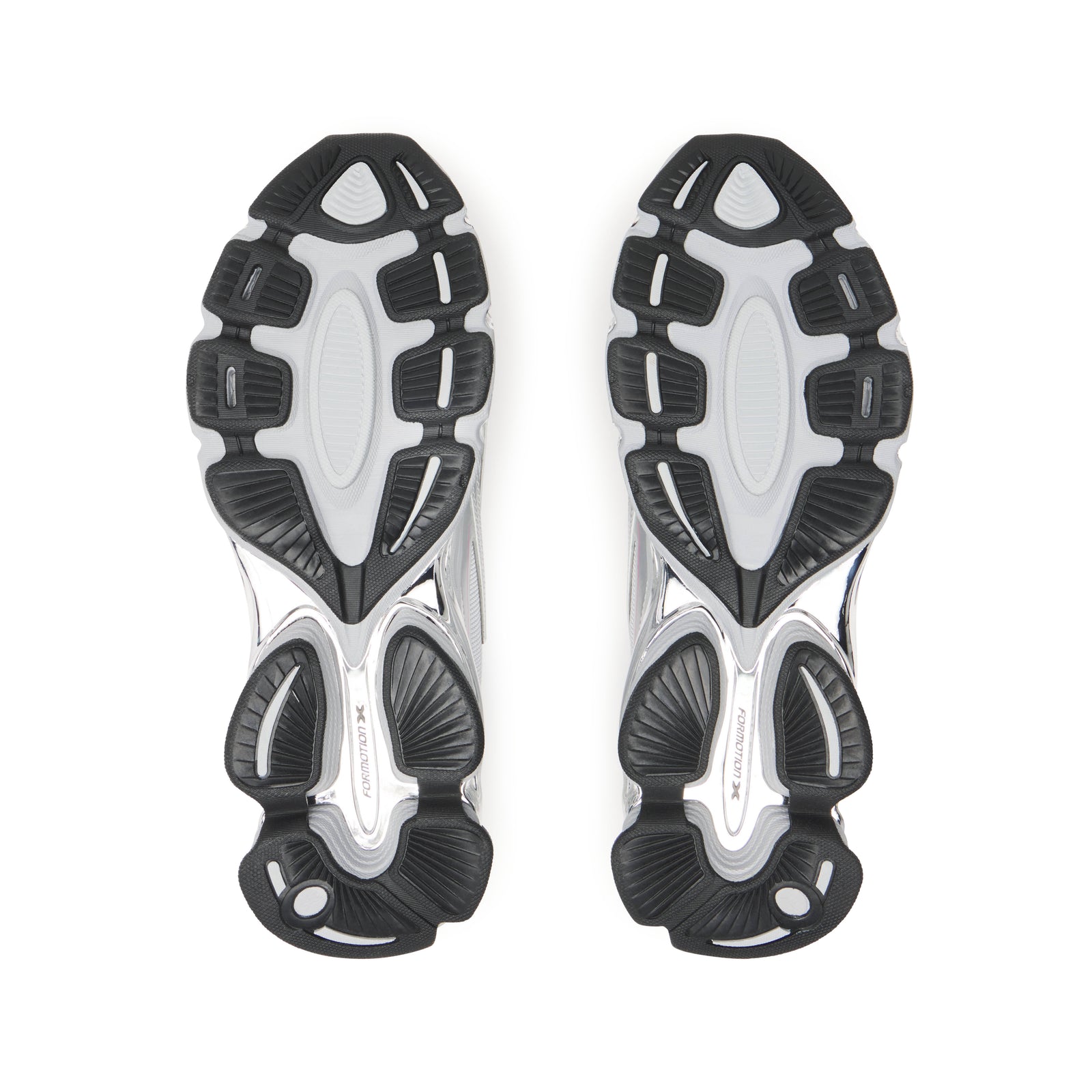 SP5DER x ADIDAS F50 ADIZERO sneakers with black, white, and chrome-finish rubber tread outsoles.