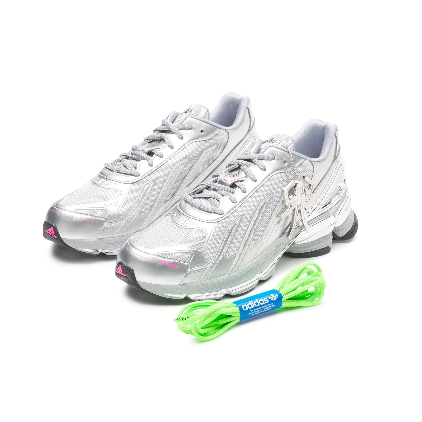 SP5DER x ADIDAS F50 ADIZERO metallic silver sneakers with pink accents, chrome overlays, and a neon green lace set.