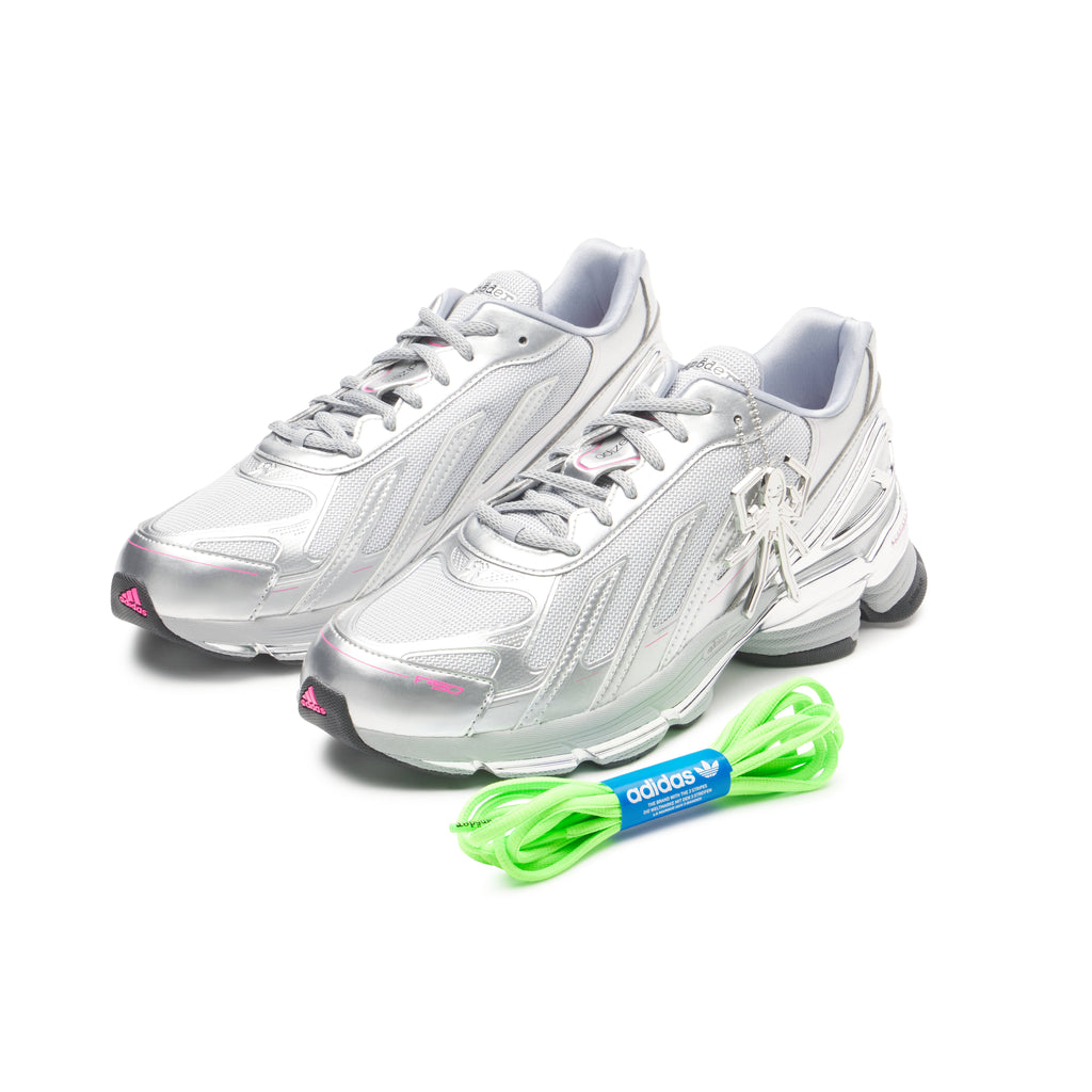SP5DER x ADIDAS F50 ADIZERO metallic silver sneakers with pink accents, chrome overlays, and a neon green lace set.