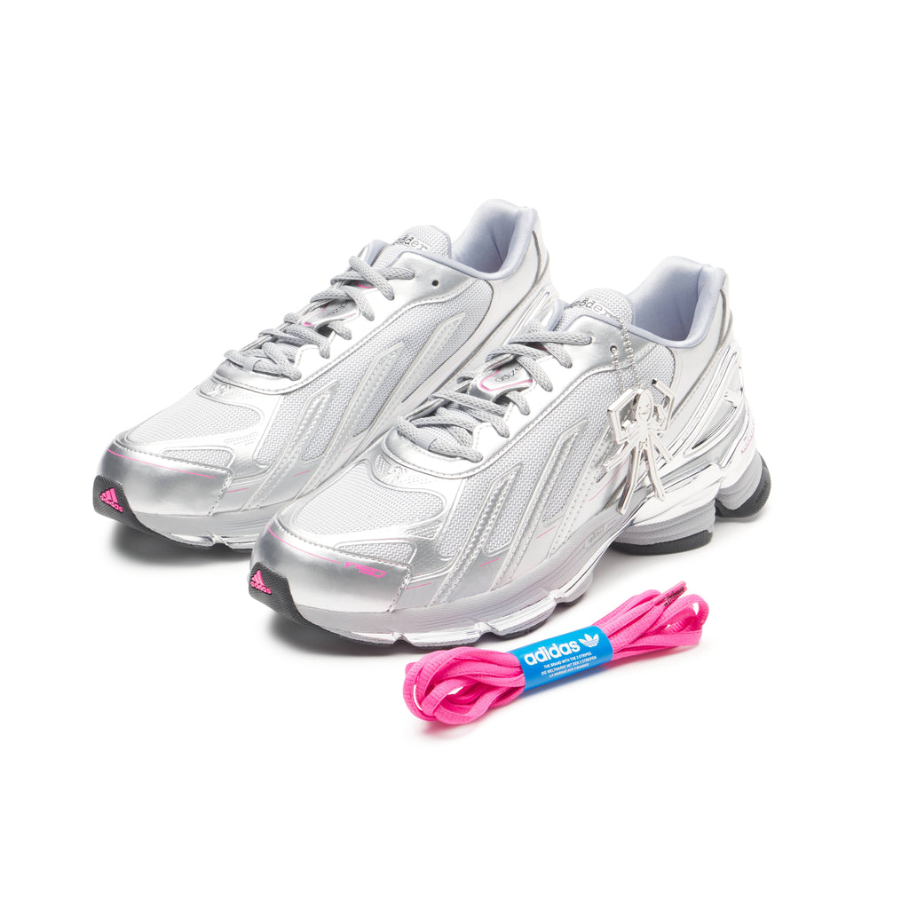 SP5DER x adidas F50 Adizero metallic silver and mesh sneakers with pink accents, chrome overlays, and a removable charm.