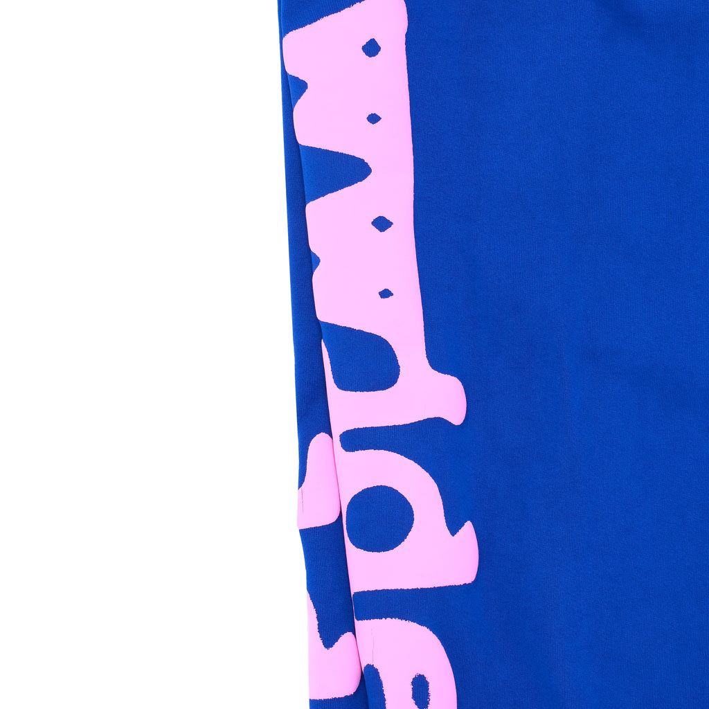 Blue Beluga sweatpant with pink "Worldwide" puff print on the side.