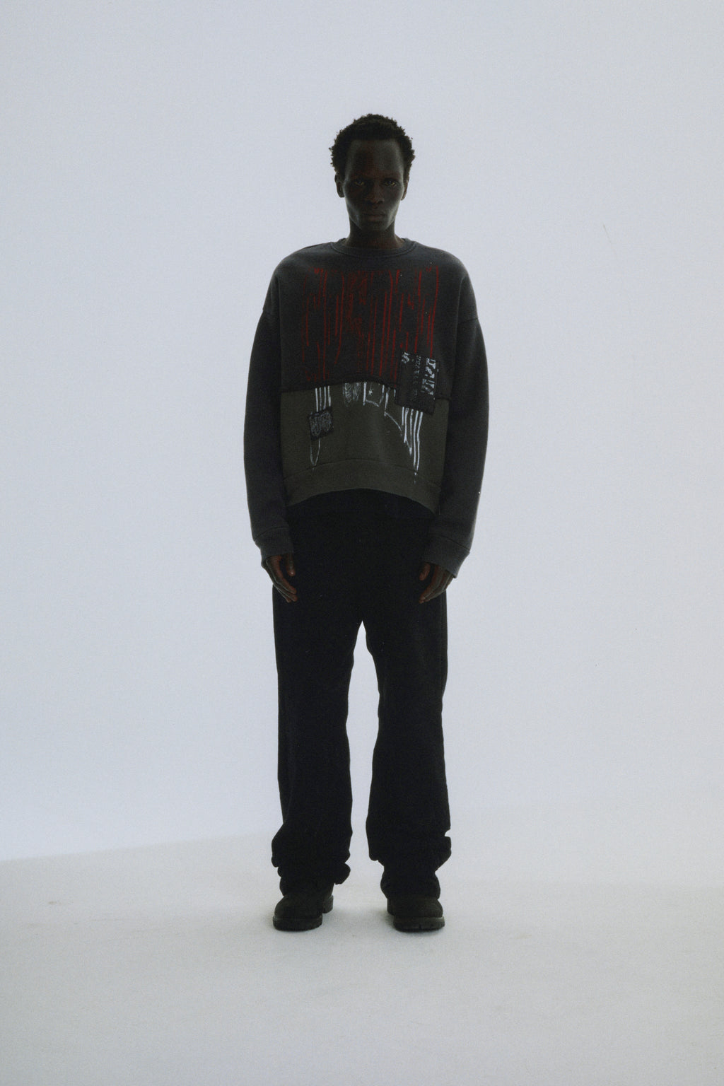 BLACK DIFFUSED COLLEGIATE CREWNECK ON MODEL