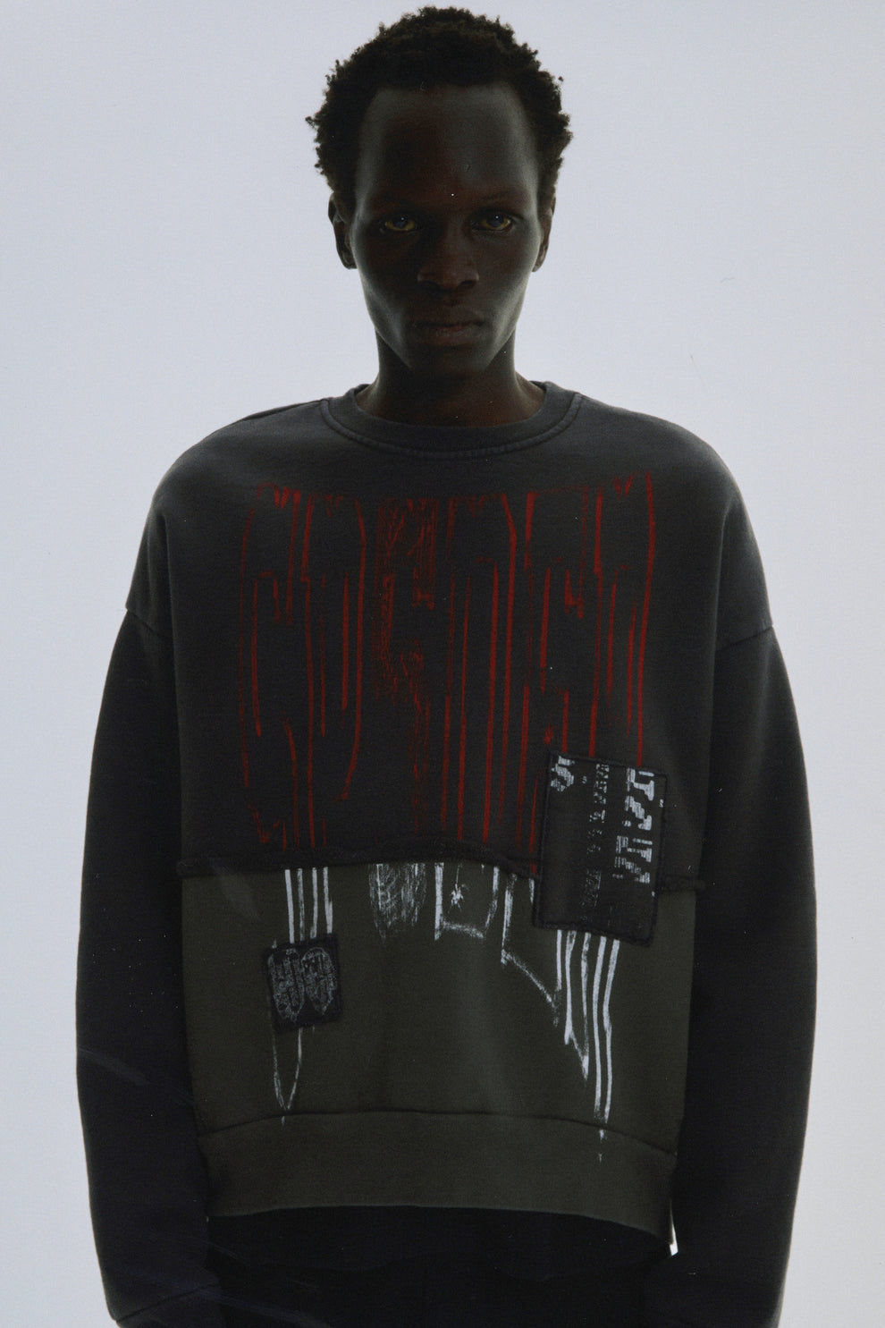 BLACK DIFFUSED COLLEGIATE CREWNECK ON MODEL