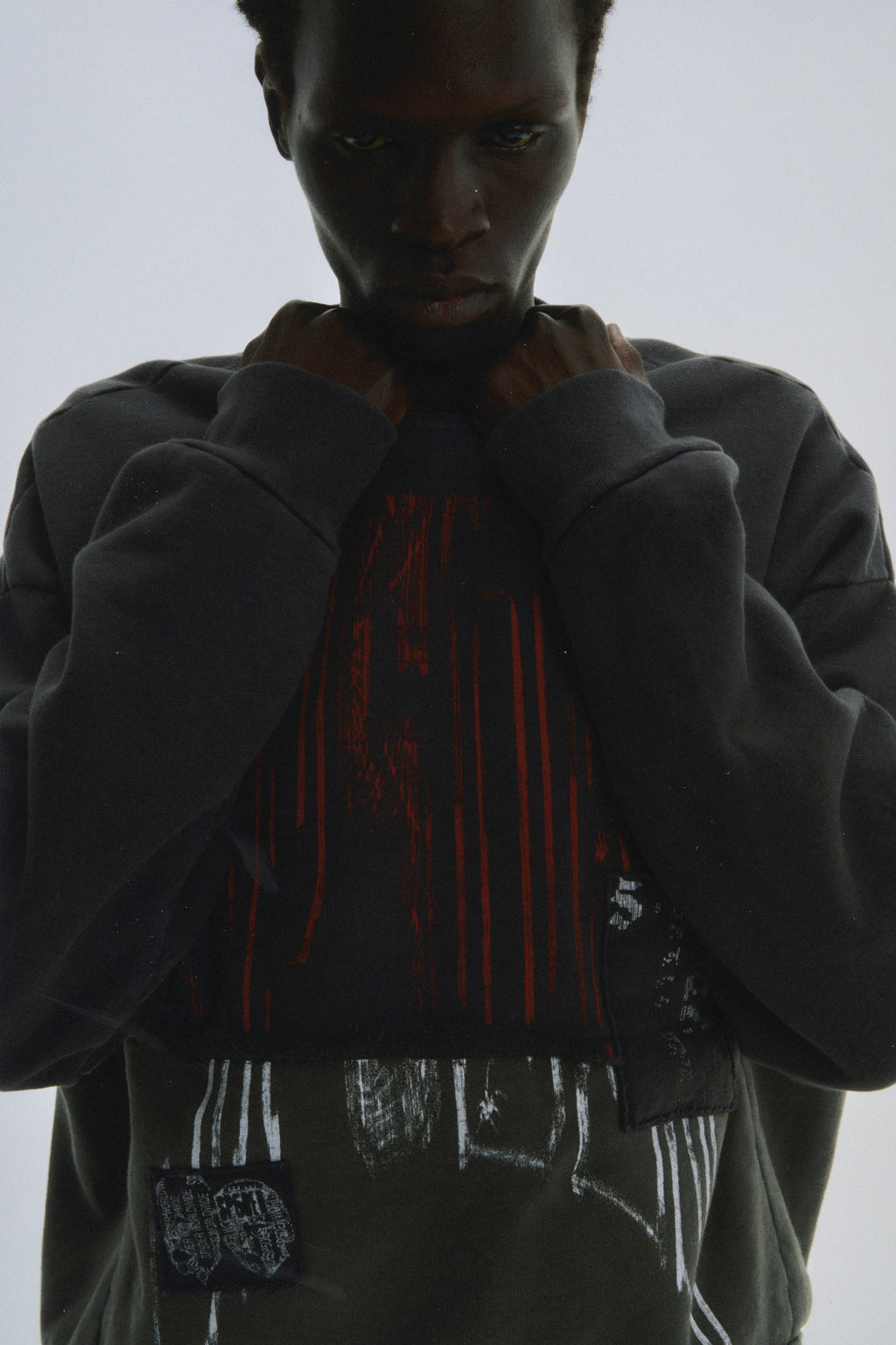 BLACK DIFFUSED COLLEGIATE CREWNECK ON MODEL