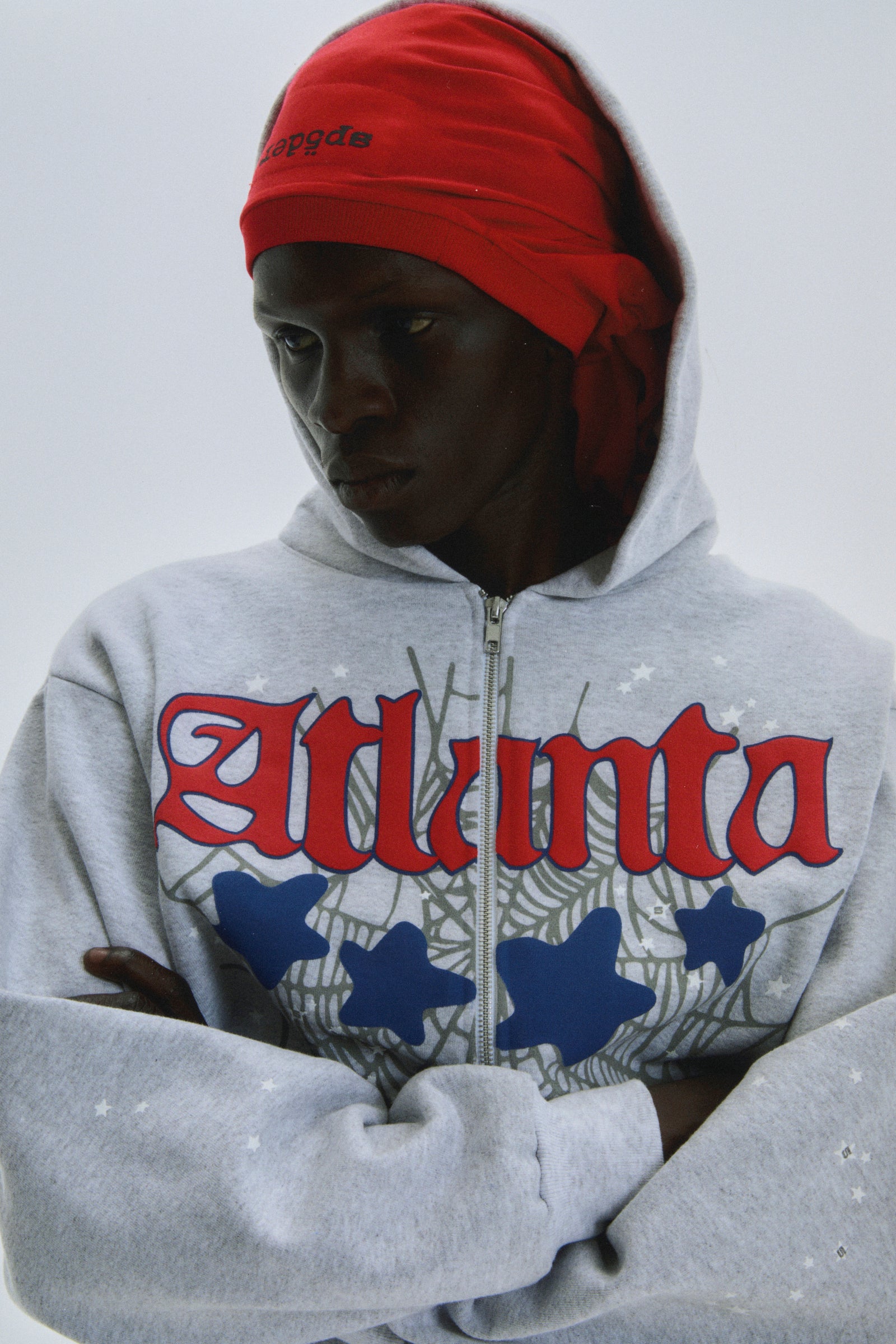 Grey 13oz cotton fleece Atlanta Full Zip Hoodie with red script, web, blue stars, and scattered star print.
