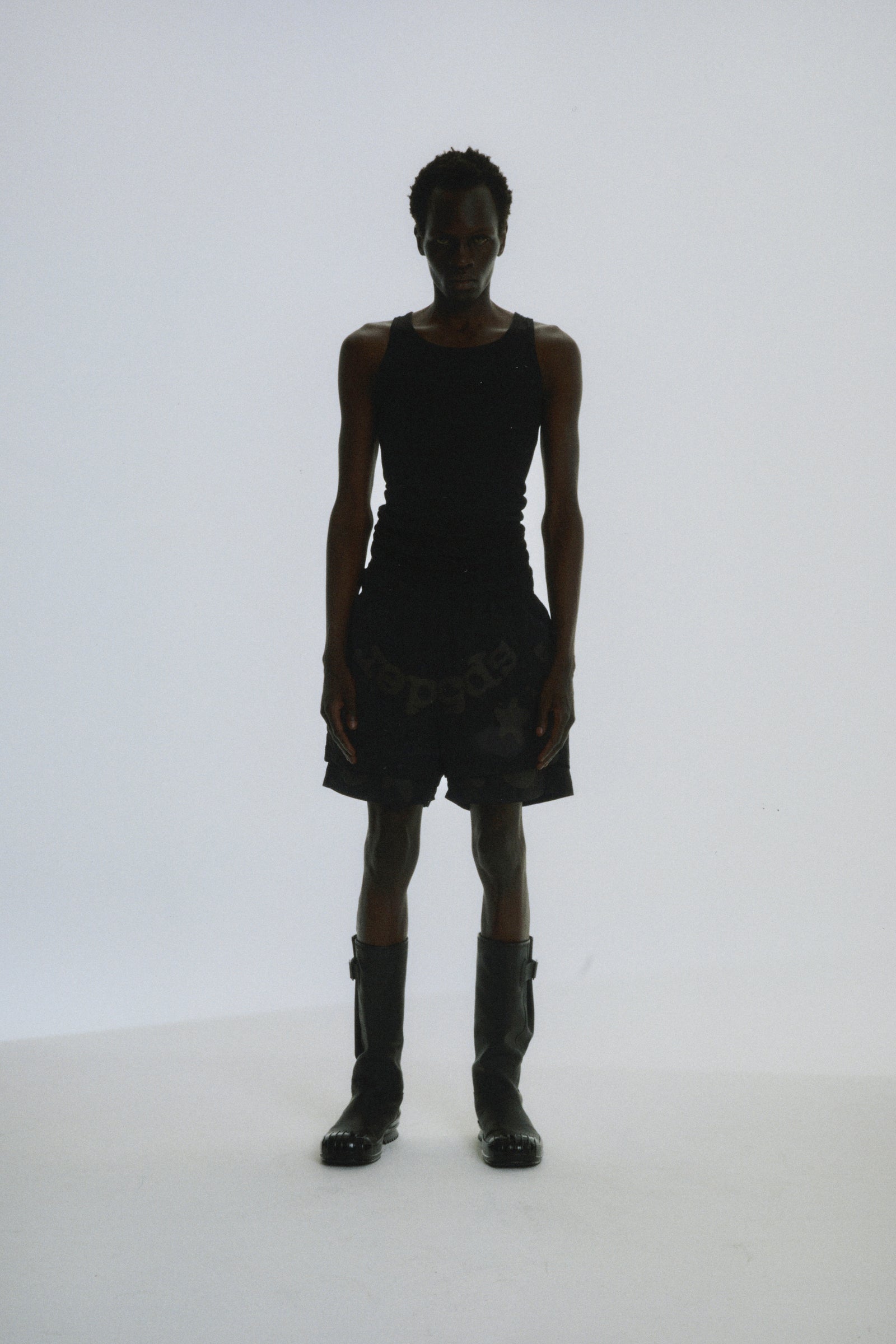 Black water-repellent nylon Beluga Double Layer Short with puff print, worn by a model.