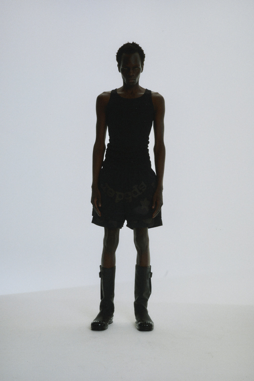 Black water-repellent nylon Beluga Double Layer Short with puff print, worn by a model.