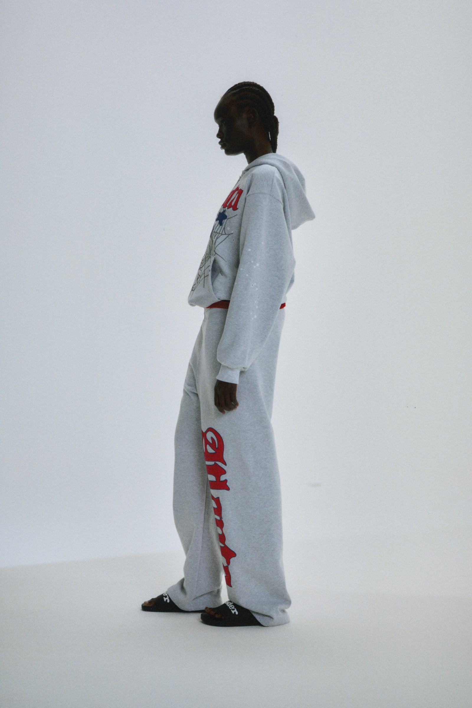 Grey cotton fleece Atlanta Full Zip Hoodie and sweatpants with red script text and scattered star print.