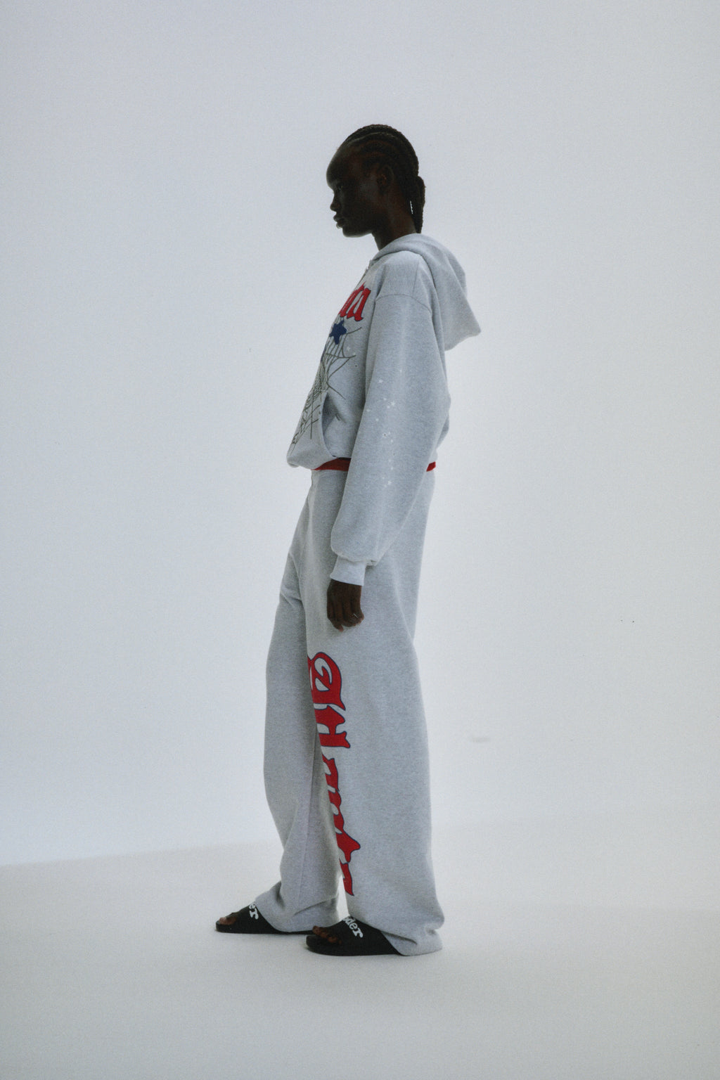 Grey cotton fleece Atlanta Full Zip Hoodie and sweatpants with red script text and scattered star print.