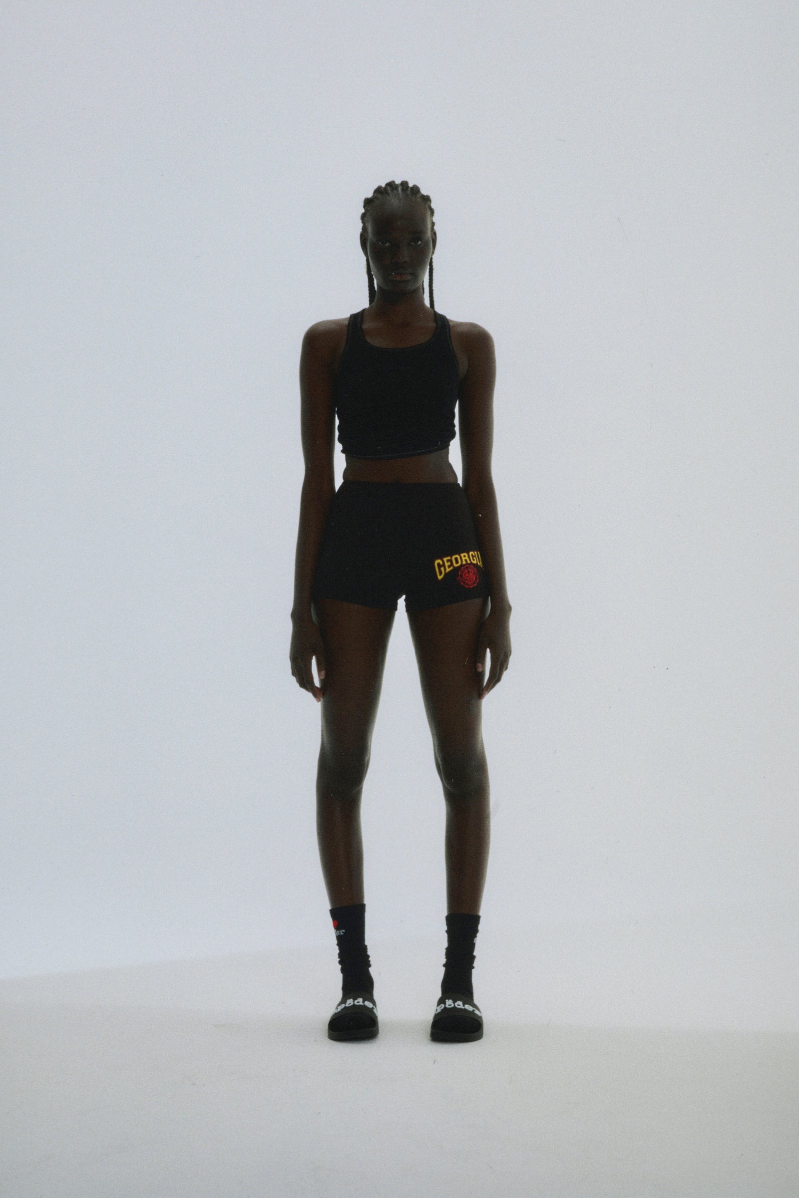 Black stretch cotton jersey shorts with "GEORGIA" collegiate graphic and elasticized waistband.