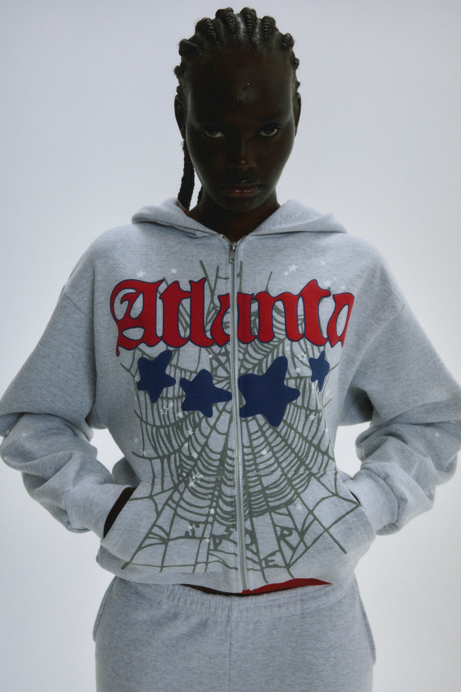 Grey 13oz cotton fleece Atlanta Full Zip Hoodie with red script text, blue stars, and spiderweb print.