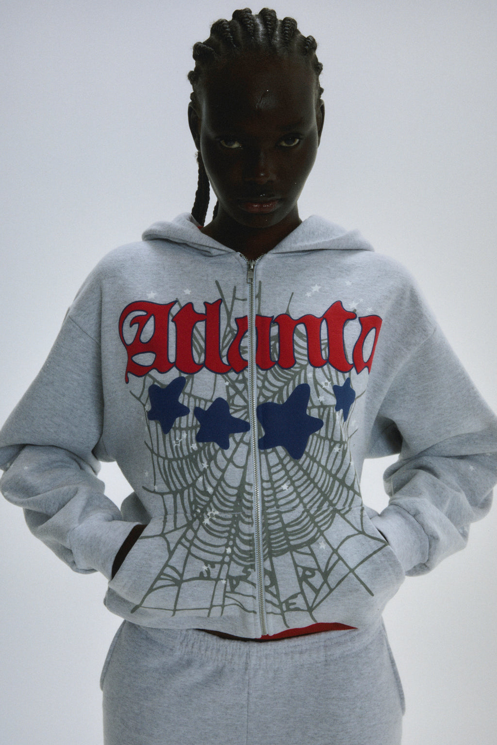 Grey 13oz cotton fleece Atlanta Full Zip Hoodie with red script text, blue stars, and spiderweb print.