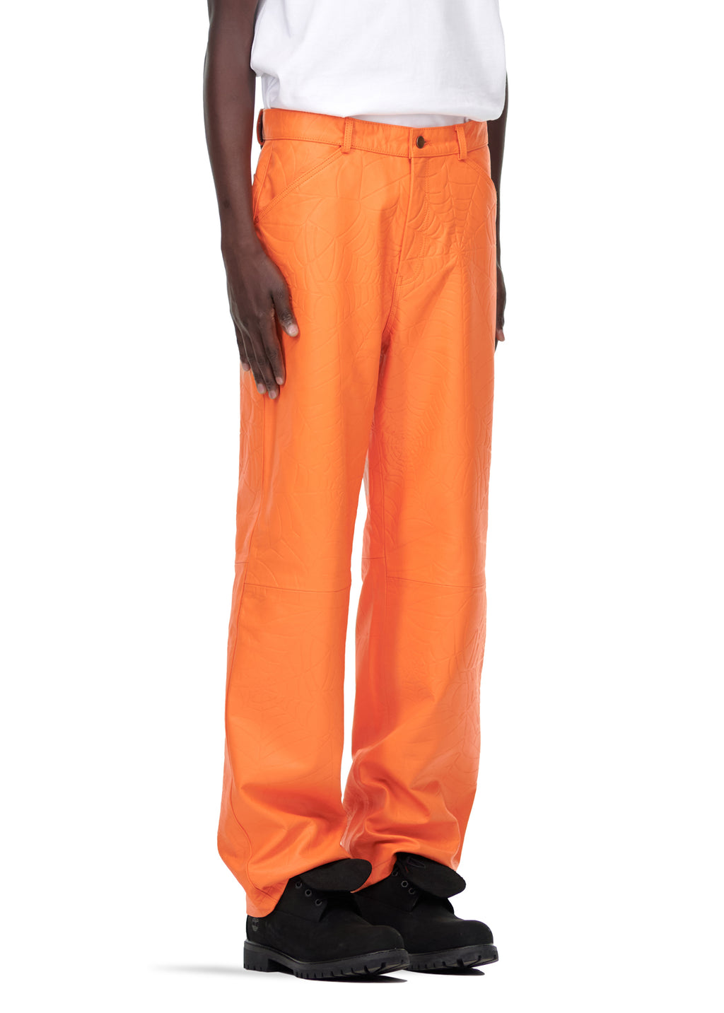 Orange debossed web cowskin leather pants with button fly, belt loops, and pink suede logo patch.