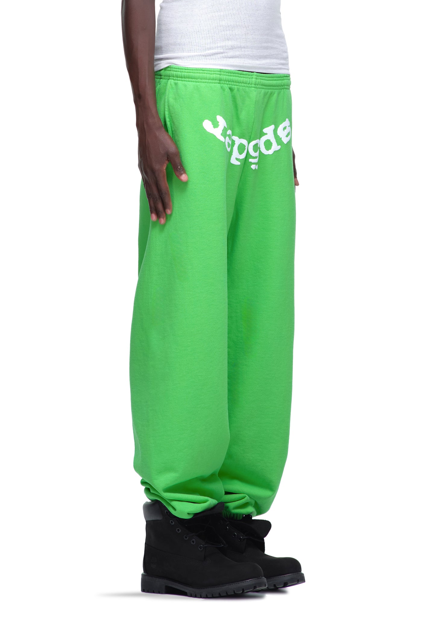 Bright green Legacy Sweatpants with white puff print "SP5DER" text on the waist, made from 23oz fleece.