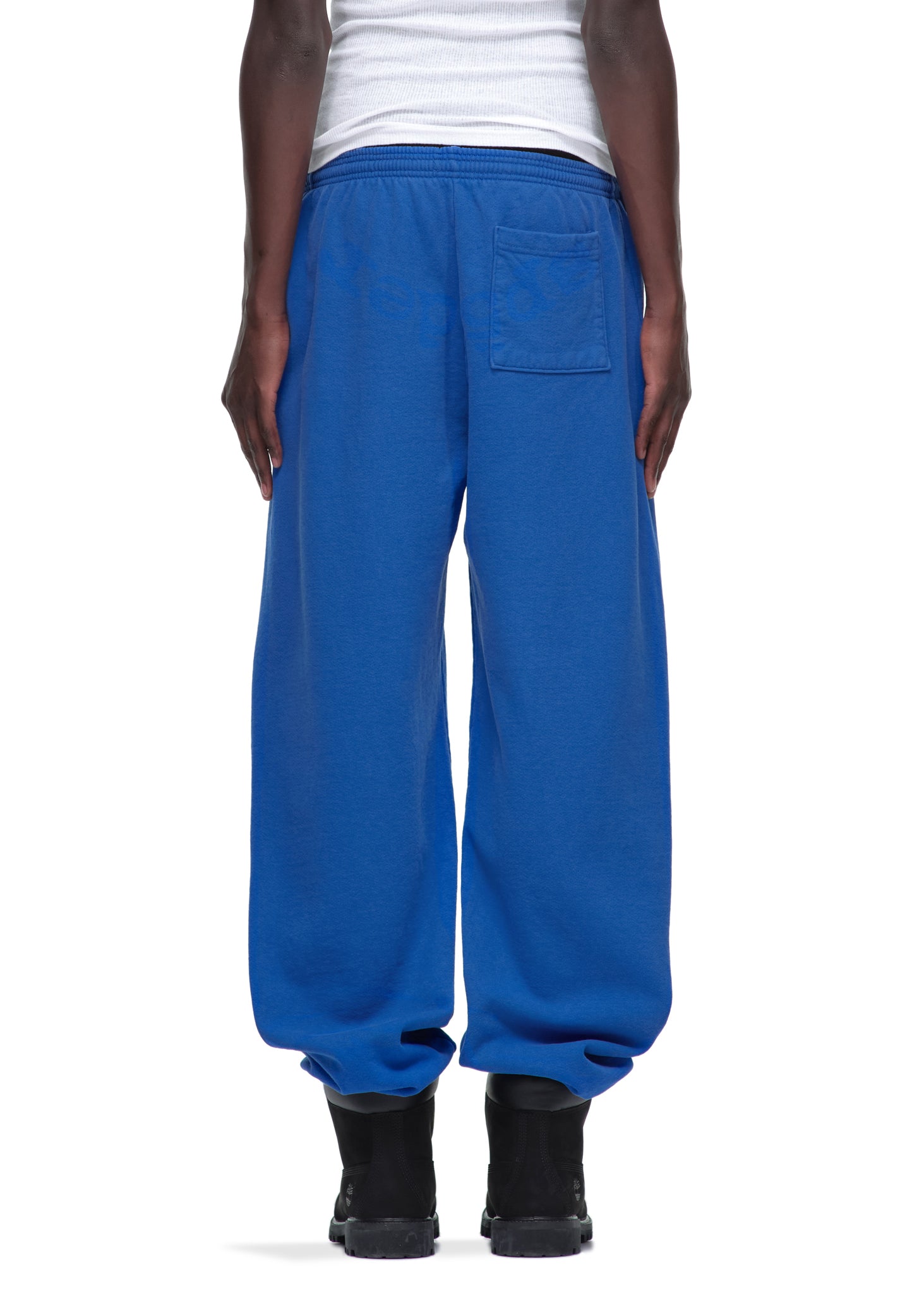 Blue LEGACY SWEATPANT, 23oz fleece, with back pocket, worn by male model.