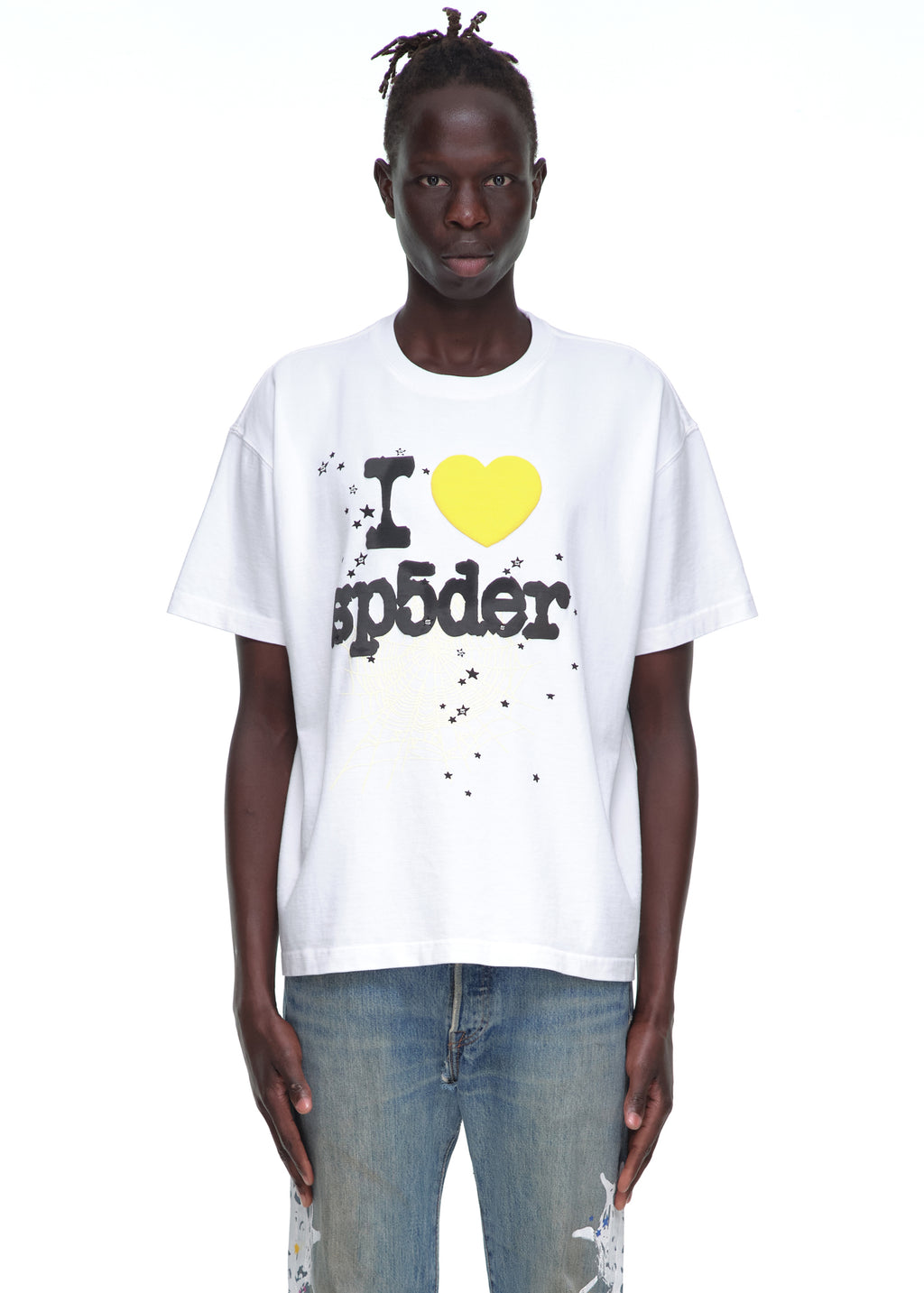 Male model in white 14oz cotton Souvenir Tee with "I <3 sp5der" graphic, black text, yellow heart.