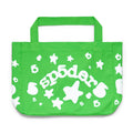 Green 8oz twill Beluga tote bag with white "sp5der" puff print, stars, and "6" graphics.