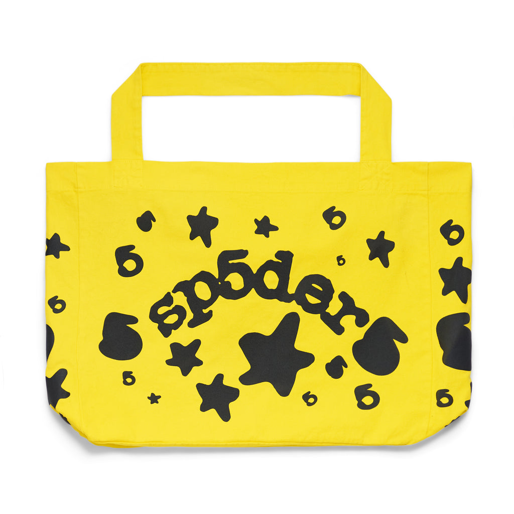 Yellow brushed twill Beluga tote bag with black "sp5der" print, stars, and numbers.