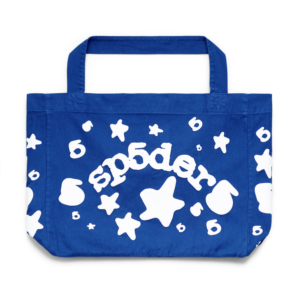 Blue 8oz brushed twill tote bag with white "sp5der" puff print, stars, and numbers.